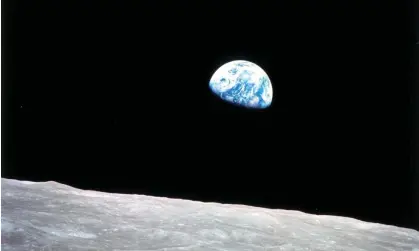  ?? Photograph: Bill Anders/NASA/EPA ?? Earthrise: the first view of the planet taken in lunar orbit.