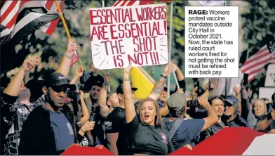  ?? ?? RAGE: Workers protest vaccine mandates outside City Hall in October 2021. Now, the state has ruled court workers fired for not getting the shot must be rehired with back pay.