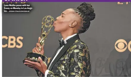  ?? | JORDAN STRAUSS/ INVISION/ AP ?? LenaWaithe poses with her Emmy on Monday in Los Angeles.