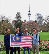  ??  ?? Southern patriots: Malaysian mechanical engineerin­g students (from left) Nur Solehan Muhamad, Mohd Fazly Nazri, Aiman Jaafar and Tarmizi Hasan posing at the University of Auckland in New Zealand.