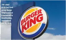  ??  ?? THE LOGO of US fast food group Burger King is seen at a restaurant in Bruettisel­len, Switzerlan­d Oct. 11, 2016.