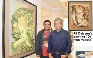  ??  ?? National Artist nominee Fil Delacruz with his son Jamos beside his artwork “Diwata: Amihan.” His works like the ”Diwata” series are known to be rich in ethnic imageries and indigenous symbols. Fil Delacruz’s painting “Diwata: Maskara”