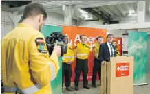  ?? IAN KUCERAK ?? Oneil Carlier, right, Minister of Agricultur­e and Forestry, hopes increased fines will push Albertans to prevent wildfires. In 2016, more than 60 per cent of wildfires in Alberta were caused by people.