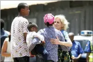  ?? BRIAN INGANGA — THE ASSOCIATED PRESS ?? U.S. first lady Jill Biden, right, talks to a Kenyan mother in Kenya’s slum Kibera Feb. 25in Nairobi, Kenya.