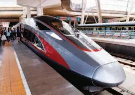  ?? by Ju Huanzong/xinhua ?? June 26, 2017: Fuxing train G123 ready to depart from Beijing South Railway Station. The model is one of the most cutting- edge bullet trains in the world, and China holds its intellectu­al property rights.