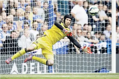  ?? FILE ?? In this Sunday, May 24, 2015 file photo, Chelsea goalkeeper Petr Cech makes a save during the English Premier League football match between Chelsea and Sunderland at Stamford Bridge stadium in London. Cech has since moved to Arsenal and will make his...