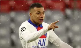  ??  ?? Kylian Mbappé celebrates after giving Paris Saint-Germain the lead in their 3-2 Champions League win at Bayern Munich on Wednesday. Photograph: Alexander Hassenstei­n/ Getty Images