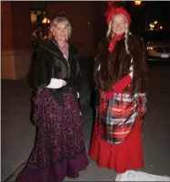  ?? LAUREN HALLIGAN - MEDIANEWS GROUP FILE ?? Terry McGuire, left, and Kathleen Crannell, right, of Lake Luzerne dress up each year for the Victorian Streetwalk in downtown Saratoga Springs.