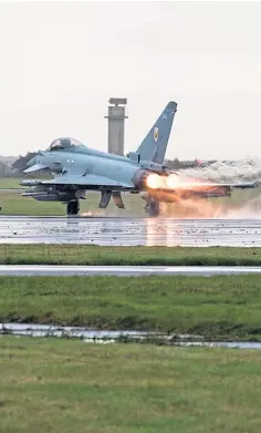  ??  ?? TOP GUN: A Typhoon jet about to take off from the base.