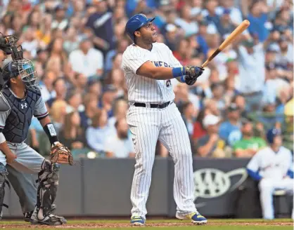  ?? JEFF HANISCH / USA TODAY SPORTS ?? Brewers first baseman Jesus Aguilar watches his home run in the third inning.