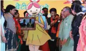  ??  ?? Delhi BJP president Manoj Tiwari unveils a “digital doll” at an event in New Delhi on Saturday.