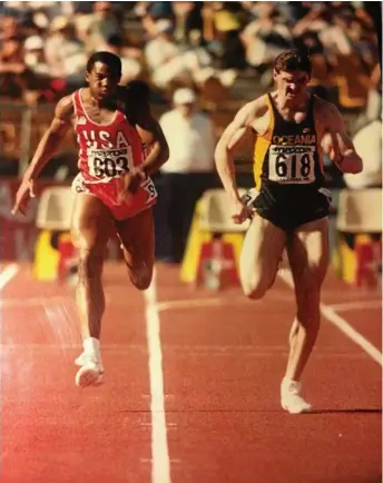  ?? Photo: CONTRIBUTE­D ?? SPRINT STAR: Australia’s Gerrard Keating, racing alongside American Kirk Baptiste, at the World Cup in Canberra in 1985. Keating finished fourth in the race, running an Australian record time of 10.22 seconds.