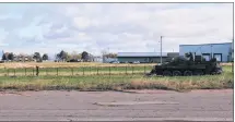  ?? COLIN MACLEAN/JOURNAL PIONEER ?? An E-LAV transport carries equipment as sappers work to set up a fence-line.