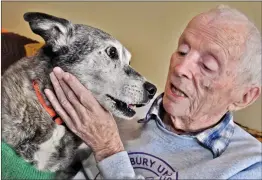  ?? Dan Watson/ The Signal ?? (Above) 16-year-old Zoe (112 years in dog years) celebrates with David Gilbert during his 104th birthday party at Gilbert’s Valencia home Saturday. (Below) Gilbert celebrates at home with close family. (Left) Gilbert bounces birthday balloons with daughter-in-law Valerie Gilbert, left, and daughter Marty Williams.