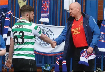  ?? ?? Rangers kitman Jimmy Bell’s passing was commemorat­ed by fans across the football spectrum with tributes outside Ibrox