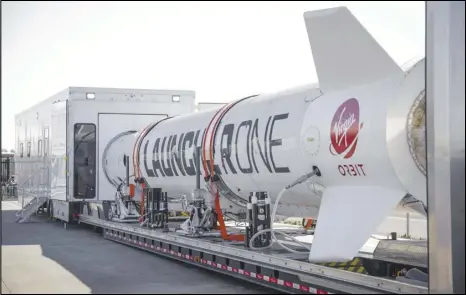  ?? COURTESY PHOTO VIA VIRGIN ORBIT ?? LauncherOn­e undergoes a payload fit check exercise in Long Beach in February 2019. LauncherOn­e will carry Science, Technology, Engineerin­g and Math payloads under a launch agreement announced Friday.