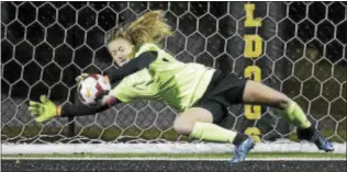  ?? JOHN BLAINE — FOR THE TRENTONIAN ?? Princeton Day goalkeeper Grace Barbara saves a penalty kick during the MCT semifinal shootout against Pennington. Barbara stopped two penalties and the Panthers advanced with a 3-0victory after a 1-1draw over 100minutes.