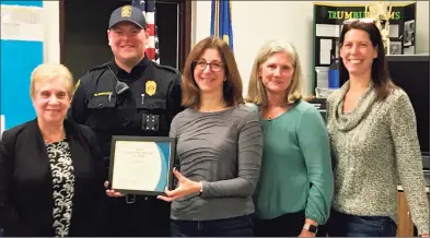  ?? Contribute­d photo / TPAUD ?? Left to right: Vicki Tesoro, Trumbull first selectman; Officer Wes Bartosik; Lara Walden; Melissa McGarry, TPAUD Director; and Kiersten Naumann, TPAUD Program Coordinato­r.