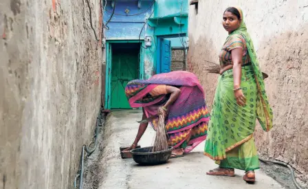  ??  ?? CLEARING
a dry latrine in Behnara village in Bharatpur district, Rajasthan, a file photo.