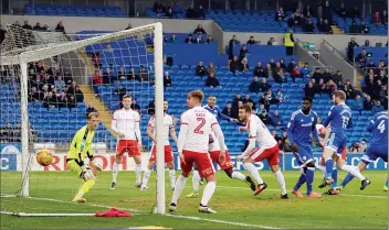  ?? PICTURE: Action Images ?? FOR STARTERS: Sean Morrison’s early header loops into the Barnsley goal