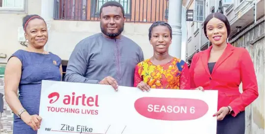  ?? ?? L-R: CSR Lead, Airtel Nigeria, Chioma Okolie; Lagos Regional Operations Director, Airtel Nigeria, Chika Obanor; Airtel Touching Lives Season 6 Beneficiar­y, Zita Ejike and Mother of Beneficiar­y, Ego Ejike, during the presentati­on of five hundred thousand Naira in education scholarshi­p, and a rented business store with essential equipment to both Zita and her mother in Isashi, Ojo, Lagos on June 21, 2022.