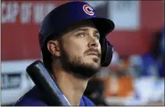  ?? AARON DOSTER - THE ASSOCIATED PRESS ?? FILE - In this Aug. 10, 2019, file photo, Chicago Cubs’ Kris Bryant (17) sits in the dugout during a baseball game against the Cincinnati Reds in Cincinnati.