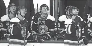  ?? ADAM CAIRNS/COLUMBUS DISPATCH ?? With the Blue Jackets out of the playoff hunt, their young players, including center Jack Roslovic, second from left, and left wing Eric Robinson, center, have a chance to take on larger roles down the stretch.