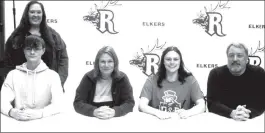  ?? Photo by Bob Parana ?? RAHS senior Celeste Cristini will compete for the Davis & Elkins Acrobatic and Tumbling team next year. Among those at her Monday signing in the school's library were her Father Brian Crisitini, Mother Nicole Cristini, her brother Nick Cristini, and cheer coach Anna Rougeaux (back).