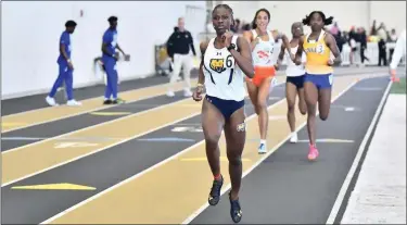  ?? STORMIE SICKLER — UNC ATHLETICS ?? University of Northern Colorado sophomore Wendira Moss runs the 400 meter dash at the Music City Challenge on Saturday, Feb. 11, 2023, in Nashville, Tennessee. Moss won the event, giving the Bears a gold medal and earning the Big Sky’s fourth-best time this season.