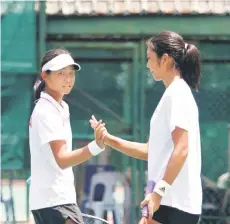  ?? ?? Zhang (right) and Dong celebrates a point won against Hong Yeri-Sim Siyeon in the girls doubles final.