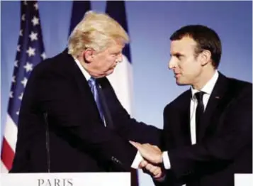  ?? | AP ?? Donald Trump y Emmanuel Macron durante la rueda de prensa de ayer, en París.