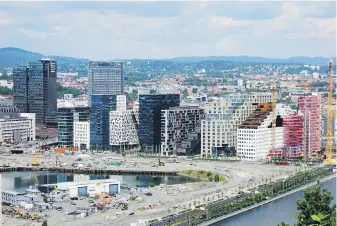  ??  ?? A sleek and distinctiv­e collection of highrises built on former industrial land, nicknamed the Barcode Project, has reshaped Oslo’s skyline.
