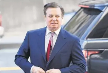  ?? /BRENDAN SMIALOWSKI / AFP/GETTY IMAGES ?? Beleaguere­d ex-Trump campaign chief Paul Manafort spends 23 hours day in solitary.