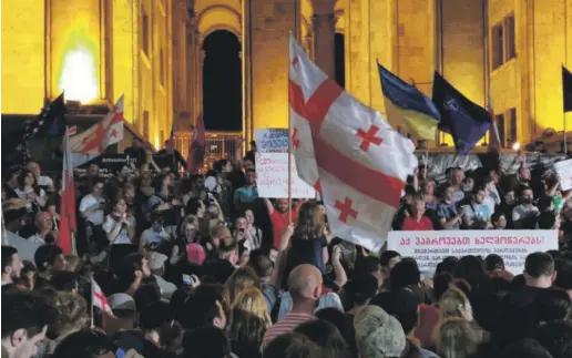  ??  ?? Thousands of protesters gather outside the parliament building in Tbilisi, Georgia, June 20, 2019.