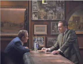  ?? NIKO TAVERNISE/NETFLIX ?? Russell Bufalino (Joe Pesci, left) is a close confidante and boss to Frank Sheeran (Robert De Niro) in Martin Scorsese’s “The Irishman.”