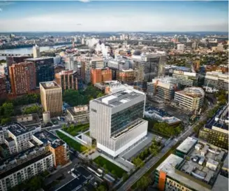  ?? ?? Above: Aerial view of the new US Department of Transporta­tion John A. Volpe National Transporta­tion Systems Center in Kendall Square, Cambridge. Right: a portion of the facade and a stairway inside.