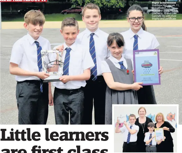  ??  ?? Super achievemen­t Matthew McLennan, 11, Blair Gordon, 11 , Matthew Grant, 10, Lily Docherty, 10 and Erin Connell, 10, with their trophy and certificat­e Bookworms Teacher Claire Hall and headteache­r Lynne McGinn with pupils Matthew Grant, 10, and Ally...
