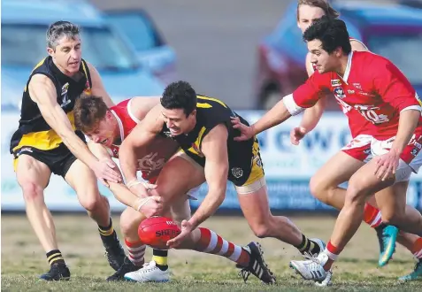  ?? Picture: GLENN FERGUSON ?? HAPPY DAY: Ocean Grove’s Shaun Fankhauser and Torquay’s Dom Gleeson go shoulder to shoulder.