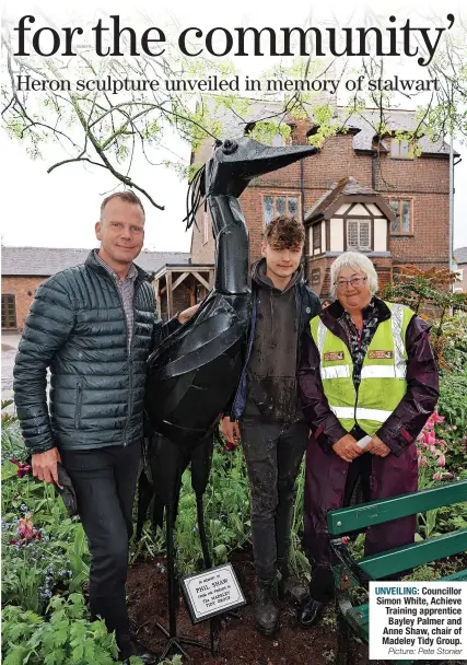  ?? Picture: Pete Stonier ?? UNVEILING: Councillor Simon White, Achieve Training apprentice Bayley Palmer and Anne Shaw, chair of Madeley Tidy Group.