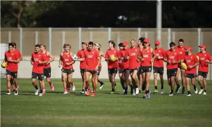  ?? Photograph: Matt King/Getty Images ?? Sydney Swans players and staff were tested for Covid-19 on Wednesday night after a positive case visited venues in the city’s east.