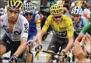  ?? BERNARD PAPON / ASSOCIATED PRESS ?? Sky Team’s Chris Froome gave up the leader’s yellow jersey following Stage 12 in the Pyrenees on Thursday.