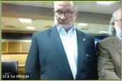  ?? USA TODAY — ASSOCIATED PRESS POOL PHOTO ?? In this photo made from video from Judge Scott McAfee's virtual Zoom hearing, Scott Graham Hall, left, stands with his attorney, Jeff Weiner, in Superior Court before McAfee, not pictured, in Atlanta on Friday.