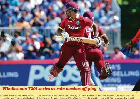  ?? AP ?? West Indies won the two-match T20I series 1-0 after the second Twenty20 Internatio­nal cricket match with India was called off due to rain. Showers halted play at the Central Broward Regional Park Stadium Turf Ground in Lauderhill, Florida yesterday...