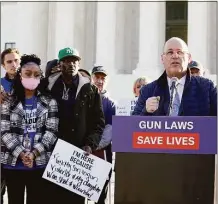  ?? Tribune News Service ?? Gun violence survivors and family members gather in front of the Supreme Court ahead of oral argument in NYSRPA v. Bruen last year in Washington, D.C.