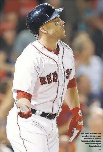  ?? AP ?? Red Sox's Steve Pearce watches his three-run home run in front of Yankees catcher Austin Romine during the fourth inning.