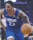  ??  ?? Lou Williams drives yesterday.