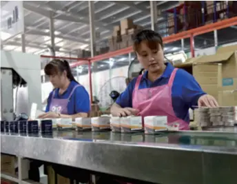  ??  ?? Employees work on the production line of an auto part enterprise in Weixian County, Hebei Province in north China on June 15. The local tax bureau has launched preferenti­al policies to support enterprise­s since the epidemic started