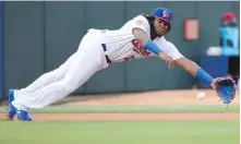  ?? NATHAN DENETTE, CP ?? New Bisons third baseman Vladimir Guerrero Jr. dives for a ball during action against Lehigh Valley on Tuesday.