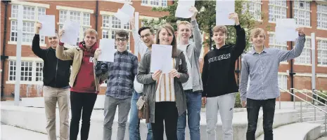  ??  ?? A-level students at Sunderland College receiving their results. Pictures: Tim Richardson