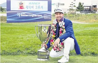  ?? ASIAN TOUR ?? Jbe Kruger poses with the Shinhan Donghae Open trophy.